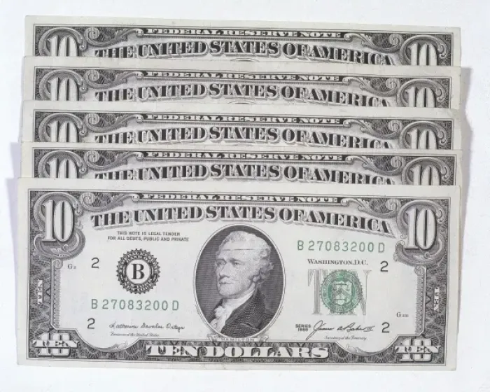 Impression encadrée : Notes de dix dollars. Impression encadrée : Notes de dix dollars.
