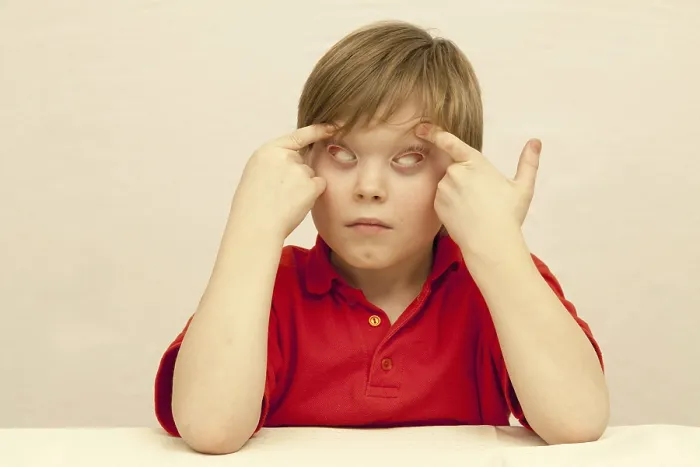 Impression encadrée : L'enfant faisant la grimace.