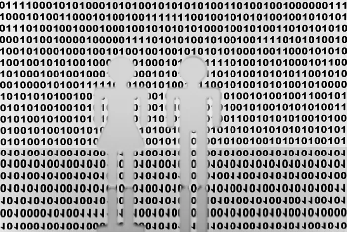 Impression encadrée : Deux figures devant le code binaire.