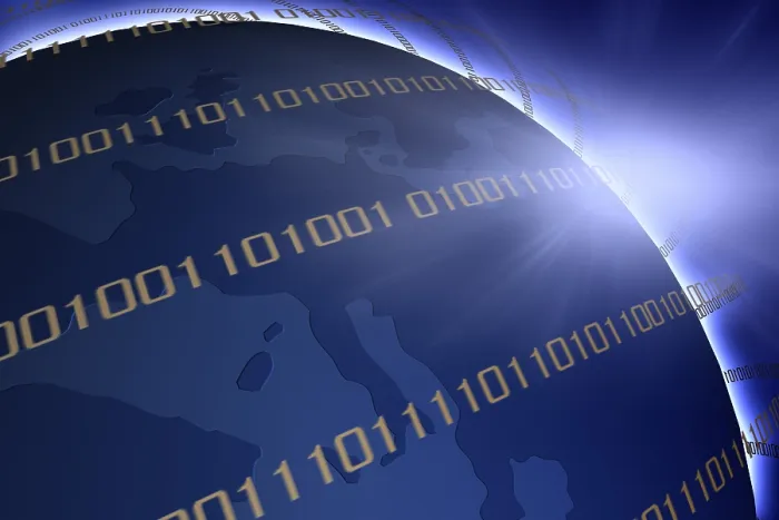 Impression encadrée : Monde avec code binaire.
