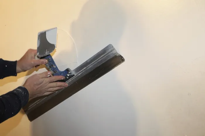 Impression encadrée : Le plâtrage intérieur.