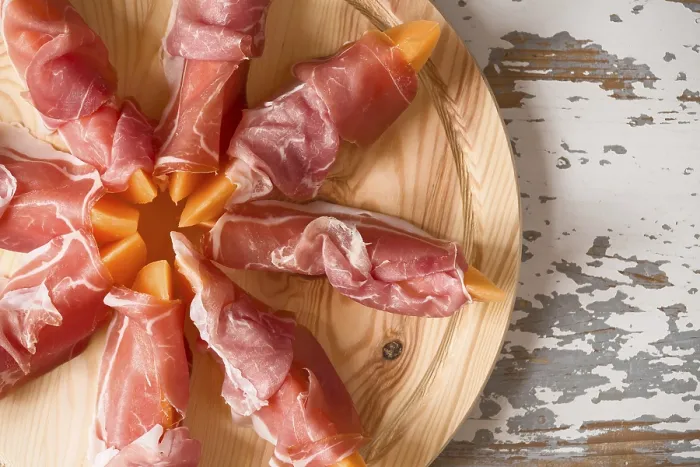 Impression encadrée : Prosciutto et melon vus de haut.