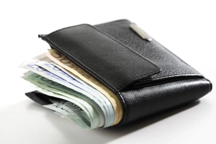 Impression encadrée : Portefeuille avec des billets.