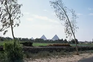 Barren Sahara Desert Scene Impressions: Distant View of Pyramids
