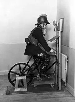 Historical Firefighting Images Impressions: Firefighter undergoing ergometer test