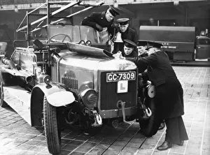London Fire Brigade Training Impressions: LCC-LFB trainees looking at an engine