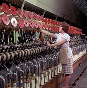Historical Textile Industry Impressions: Operating a wool-winding machine
