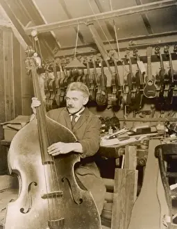Stringed Instrument Maker Impressions: Stringed instrument maker in his workshop