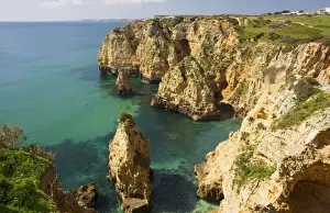 Ponta Da Piedade Cliffs Impressions: Eroding cliffs, stacks and islets at Ponta da Piedade, near Lagos, Algarve, Portugal