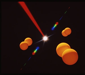 Images datées de 1996: Artwork informatique de laser divisant une molécule.