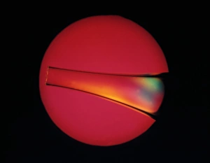 Polarised Light Micrograph Impressions: Defects in plastic, light micrograph