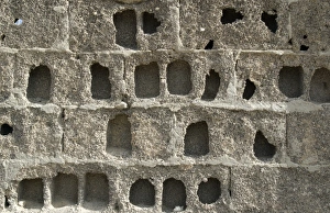 Weathered Stone Wall Impressions: Eroded block wall