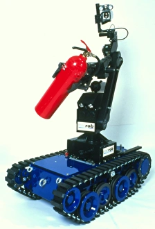 Impressions de Le robot pompiers. Le robot conçu pour lutter contre les incendies dans des zones dangereuses telles que les usines chimiques ou réacteurs nucléaires Images datées de 1998 février: Robot de combat contre l'incendie
