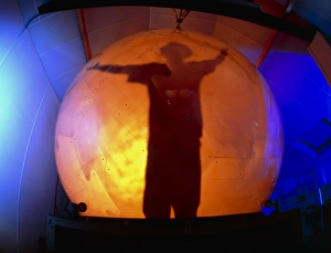 Virtual Reality Technology Impressions: Man silhouetted in the virtual reality cybersphere