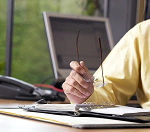 Businessman At Desk Impressions: Office computing