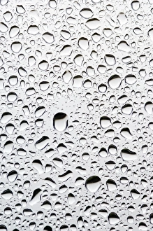 Window Pane Raindrops Impressions: Raindrops on a window pane