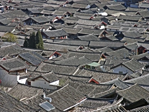 Impressions de Les toits de l'ancienne ville de Lijiang en Yunnan, Chine. La zone historique du centre-ville de Lijiang est un site du patrimoine mondial de l'UNESCO Images datées de 2007 mars: Rooftops
