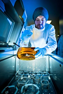 Scientific Research Tools Impressions: Scientist using sample agitator