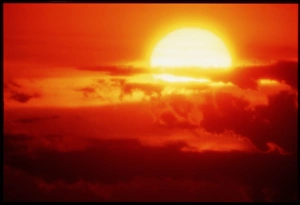Sunset Cloud Formations Impressions: Sun setting behind clouds