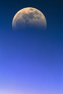 Moon Phases Impressions: View of a partial lunar eclipse