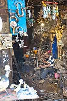 Marrakech Souk Impressions: Carpenter and metalworker in his workshop in the souk