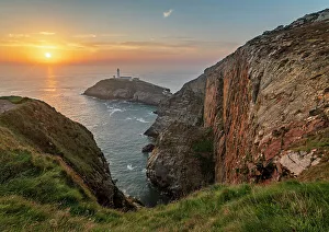 Holy Island Wales Impressions: Cliffs and South Stack Lighthouse at sunset