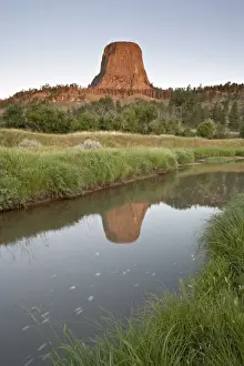 Devils Tower National Monument Impressions: Devils Tower reflected in a stream, Devils Tower National Monument