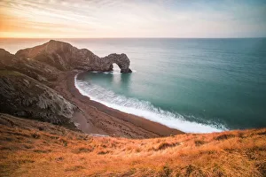 La porte de Durdle au lever du soleil à côte jurassique lulthorpe unesco site patrimoine mondial