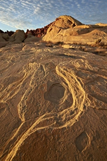 Erosion Patterns In Rocks Impressions: Erosion pattern in yellow sandstone under patterned clouds