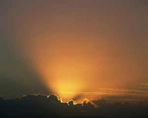 Outdoor Travel Images Impressions: Rays of light bursting out of dark clouds