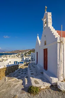 Greek Island Hopping Guide Impressions: View of whitewashed chapel overlooking town, Mykonos Town, Mykonos, Cyclades Islands