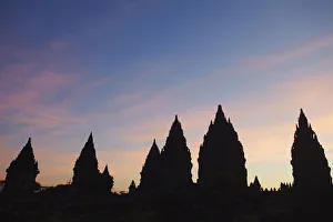 Javanese Architecture Style Impressions: Temples at Prambanan complex at sunset, Java, Indonesia