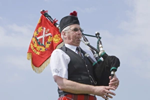 Traditional Scottish Music Impressions: A bagpipe player