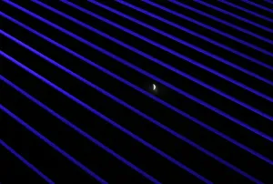 Total Lunar Eclipse Impressions: The moon is seen during the beginning of a total lunar eclipse through the structures of