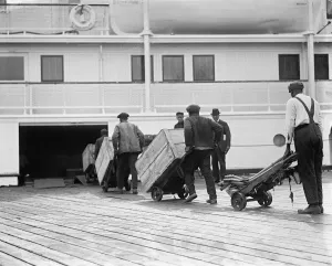 Vintage Shipping Images Impressions: LOADING FREIGHT, c1924. Dockworkers loading cargo onto a steamship. Photograph, c1924