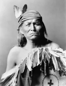 Vintage Native American Art Impressions: APACHE MAN, c1903. Portrait of an Apache man. Photograph by Edward Curtis, c1903