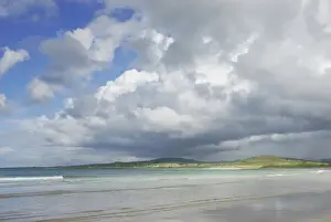 Donegal Coastline Photography Impressions: Light patterns on flat sandy beach with clouds
