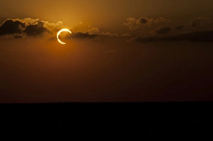 Backlit Cloud Formations Impressions: Annular Solar Eclipse