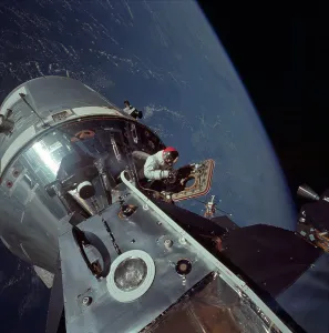 NASA Space Exploration Impressions: Apollo 9 Command and Service Modules and Lunar Module with Earth in background