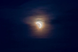 Partial Lunar Eclipse Impressions: May 26, 2021 - Partial lunar eclipse in clouds