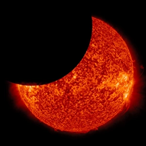 Solar Eclipse Photography Impressions: A partial solar eclipse from space