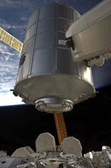 International Space Station Impressions: The Permanent Multipurpose Module in the grasp of Canadarm2