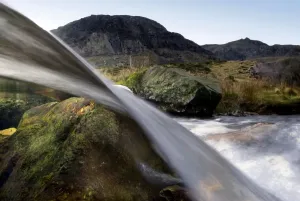 Blurred Motion Waterfalls Impressions: A split-level view through a small waterfall, Llanberis, Snowdonia NP, Gwynedd, Wales