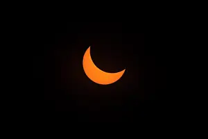 American Natural Wonders Impressions: Partial eclipse of the sun prior to total eclipse