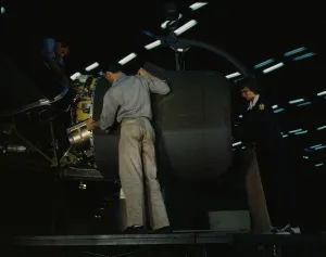 Aeronautical Engineer Impressions: Lowering an engine in place in assembling a C-87