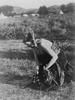 North American Ethnography Impressions: Offering the pipe to the Earth-Cheyenne, c1910. Creator: Edward Sheriff Curtis