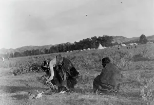 Native American Rituals Impressions: Offering pipe to the skull-Cheyenne, c1910. Creator: Edward Sheriff Curtis