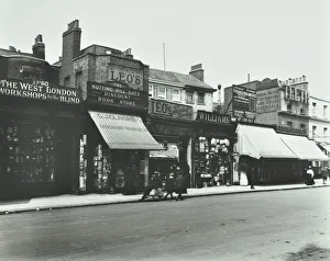 Kensington High Street History Impressions: Row of shops including the West London Workshops for the Blind, London, 1913
