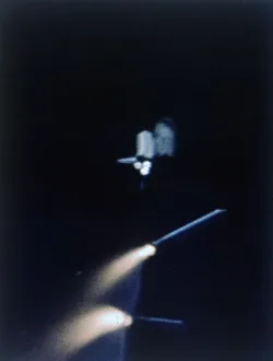 Space Shuttle Launch Impressions: Solid rocket booster separates, first Space Shuttle flight, 12 April 1981. Creator: NASA