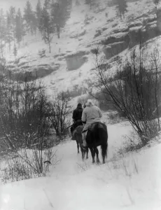 Black And White Winter Landscape Impressions: Winter hunter[s]-Apsaroke, c1908. Creator: Edward Sheriff Curtis